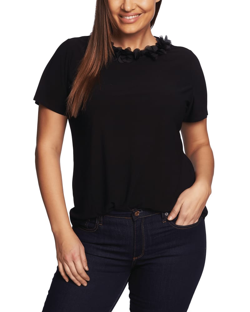 Front of a model wearing a size 1X Rhoda Floral Applique Top in 060-RICH BLACK by CeCe. | dia_product_style_image_id:263788